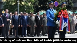 Serbian President Aleksandar Vucic (far left) leads official St. Vitus's Day commemorations in Belgrade on June 28.