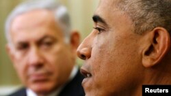 U.S. -- U.S. President Barack Obama meets with Israel's Prime Minister Benjamin Netanyahu (L) in the Oval Office of the White House in Washington October 1, 2014.