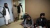 FILE: Jailed Taliban are seen during an interview with thew the Associated Press in Pul-e-Charkhi jail in Kabul in December 2019.