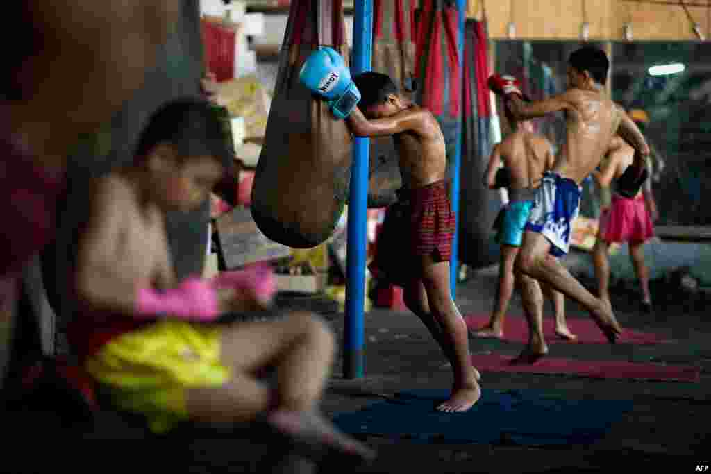 Young Muay Thai boxer resting between fights