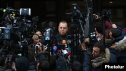 Armenia - Former Defense Minister Vigen Sargsian speaks to journalists outside a polling station in Yerevan, December 9, 2018.