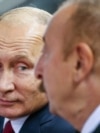 Президент Росії Володимир Путін та президент Азербайджану Ільгам Алієв беруть участь у 32-му чемпіонаті світу з дзюдо на Національній арені гімнастики в Баку, Азербайджан, 27 вересня 2018 року