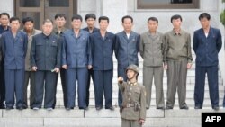 A group of North Koreans visit their side of the truce village of Panmunjom in the Demilitarized Zone separating the two Koreas on September 29.