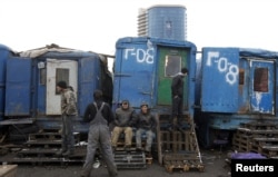 Көкөніс базарында жұмыс істейтін мигранттар. Мәскеу, 11 қараша 2011 жыл. (Көрнекі сурет)