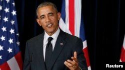 U.S. President Barack Obama speaks during a news conference with the British prime minister at the G7 summit in Brussels.