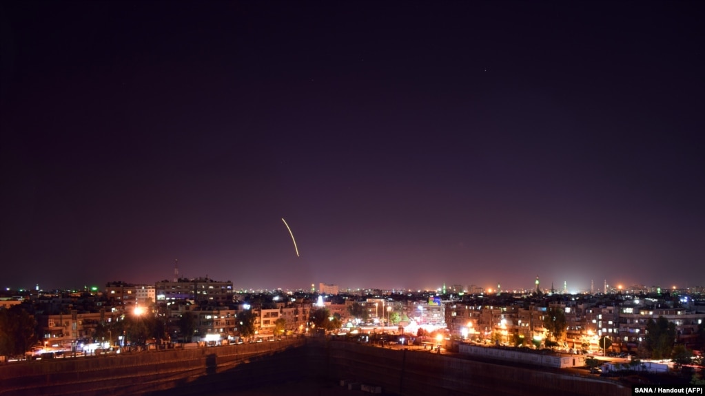 A handout picture released by the official Syrian Arab News Agency (SANA) on September 15, 2018, reportedly shows Syrian air defense batteries responding to what the Syrian state media said were Israeli missiles targeting Damascus international airport.