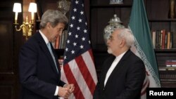 Iranian Foreign Minister Javad Zarif (right) asked for UN intervention one week after meeting with U.S. Secretary of State John Kerry.