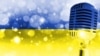 GENERIC – Microphone on a background of a blurry flag Ukraine close-up