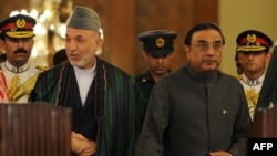 Pakistani President Asif Ali Zardari (right) and his Afghan counterpart, Hamid Karzai, at a previous meeting in Islamabad in September