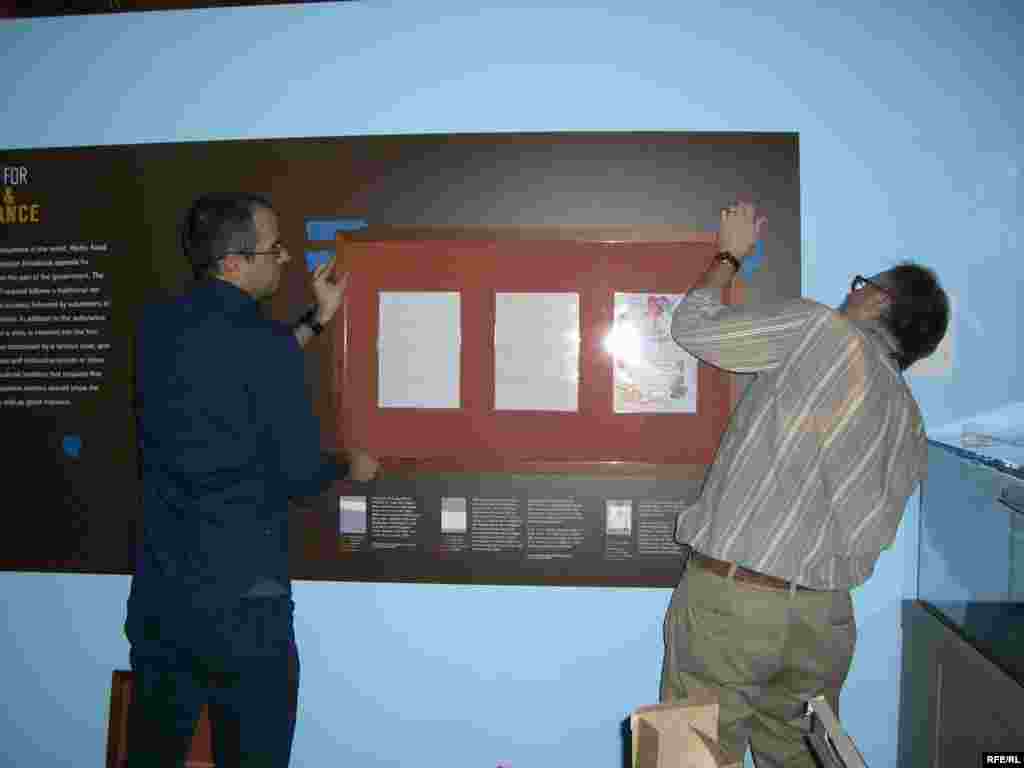 Employees from the Library of Congress set up the "Voices From Afghanistan" exhibit in Washington, D.C.