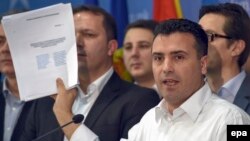 Macedonia -- SDMS leader Zoran Zaev shows a list of journalists' names he claims were subjected to wiretapping during a press conference in Skopje, February 25, 2015.
