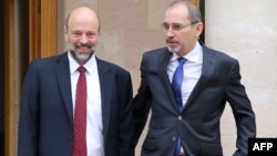 Новый премьер-министр Иордании Омар Раззаз (слева) и новый министр иностранных дел Айман Сафади (архивное фото) 