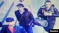 An image from a CCTV camera shows the three men believed to be the attackers walking inside the terminal building at Istanbul's Ataturk airport on June 28.