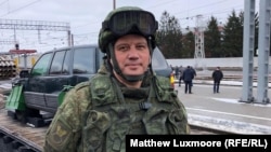 Russian military adviser Andrei Selivanov in Kursk with military hardware that Moscow says it seized from Islamic State in Syria.