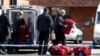 Inspectors from the Organization for the Prohibition of Chemical Weapons arrive to begin work at the scene of the nerve-agent attack on former Russian agent Sergei Skripal in Salisbury on March 21.