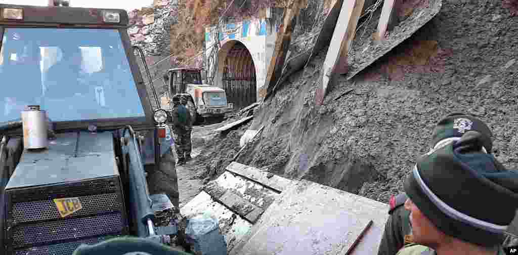 Indo Tibetan Border Police (ITBP) personnel undertake rescue work at one of the hydropower project at Reni village in ​​Chamoli district of Indian state of Uttrakhund, Monday, February 8, 2021.