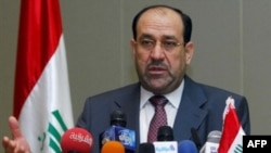 نخست وزیر عراق گفته است که معاهده امنیتی میان بغداد و واشینگتن به همسایگان عراق نشان داده می شود.(عکس: AFP)