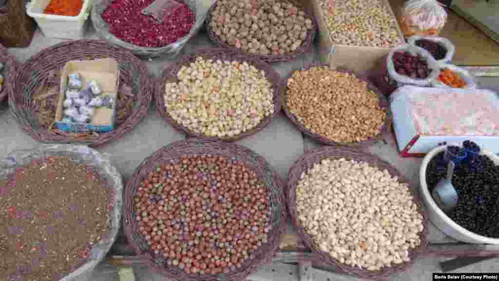 Beans, grains, and spices on sale at a market in Kandovan