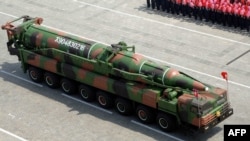 A missile on a vehicle during a military parade commemorating the 100th anniversary of the birth of former North Korean President Kim Il Sung in Pyongyang on April 15