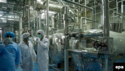 Technicians of the International Atomic Energy Agency inspect the site of the uranium conversion plant in Isfahan, February 3, 2007