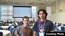 Uzbek language Wikipedia contributor Nodir Atayev,right, at Wikimania 2012 conference, 02Oct2012