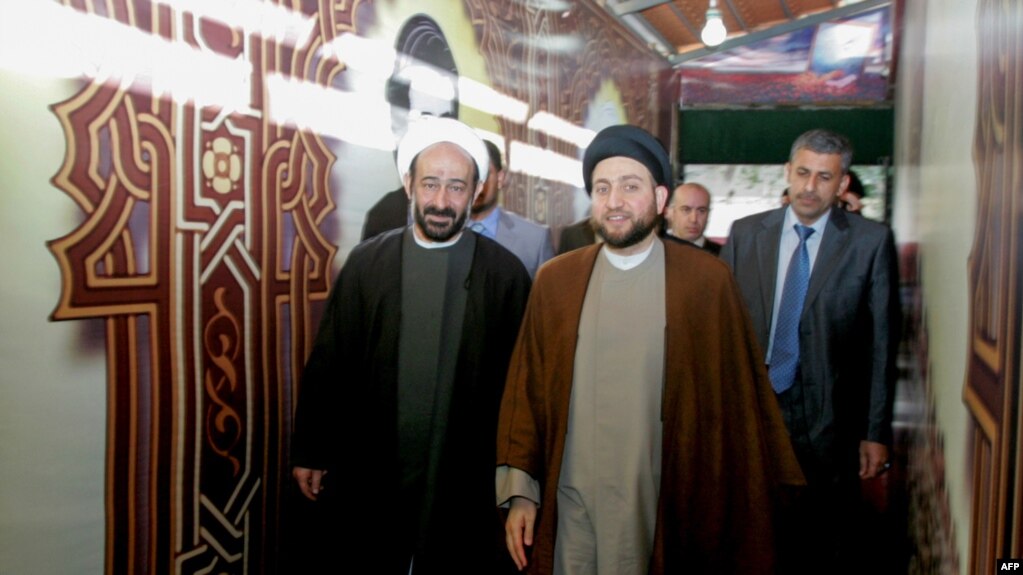 محمد کوثرانی (چپ) در کنار عمار حکیم از رهبران شیعه عراق در سال ۲۰۱۰