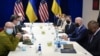 Встреча президента США Джо Байдена с главой МИД Украины Дмитрием Кулебой и украинским министром обороны Алексеем Резниковым. Варшава, 26 марта 2022 года
