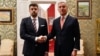 Serbian Ambassador to Montenegro Vladimir Bozovic (left) with Montenegrin President Milo Djukanovic in January this year. 