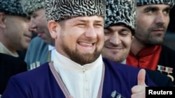 Президент Чечни Рамзан Кадыров в национальном костюме во время празднования Дня чеченского языка. Грозный, 25 апреля 2010 года.
