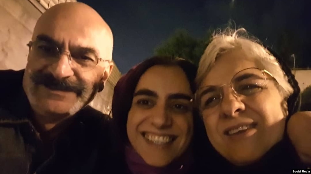 Aras Amiri (center) was jailed in 2019.