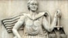 Iran -- The statue of "Lady Justice" on the top of the entrance of Tehran courthouse, undated.