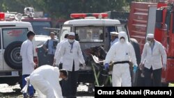 AFGHANISTAN - Afghan investigators work at the site of a suicide attack in Kabul, Afghanistan July 24, 2017