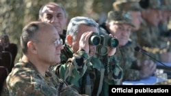 Nagorno-Karabakh - Armenian President Serzh Sarkisian watches a military exercise, 20Nov2015.