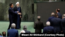 Iranian President Hassan Rouhani appeared before parliament on Aug. 28 to answer questions on his government's handling of Iran's economic struggles.