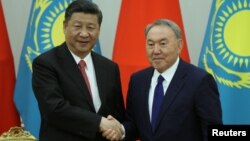 Қазақстан президенті Нұрсұлтан Назарбаев пен Қытай төрағасы Си Цзиньпин. Астана, 8 маусым 2017 жыл.