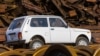 Lada Niva photographed at train scrapyad