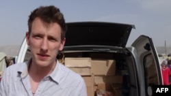 Abdul-Rahman (Peter) Kassig's family released this photo on October 4 showing him somewhere along the Syrian border between late 2012 and fall 2013 delivering supplies to refugees. 