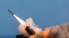 German soldiers assigned to Surface Air and Missile Defense Wing 1, fire the Patriot weapons system at the NATO Missile Firing Installation, in Chania, November 8, 2017. File photo
