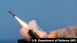 German soldiers assigned to Surface Air and Missile Defense Wing 1, fire the Patriot weapons system at the NATO Missile Firing Installation, in Chania, November 8, 2017. File photo