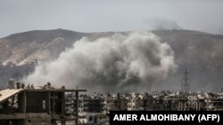 Бои в окрестностях Дамаска, столицы Сирии, 19 марта 2017 г.