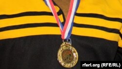تصویر مدال ورزشی در اینجا جنبه تزئینی دارد