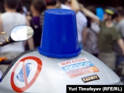 "Blue bucket" protesters have been mobilized across Russia against the abuse of road privileges for top bureaucrats.