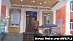 Heavy snow greeted voters at polling stations in Almaty.