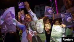 Митинг сторонников действующего президента Хасана Роухани. Тегеран, 17 мая 
