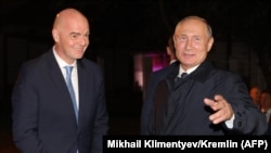 Russian President Vladimir Putin (right) welcomes FIFA President Gianni Infantino upon his arrival in Vladivostok in September 2019.