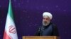 IRAN -- Iranian President Hassan Rohani speaks at a ceremony to mark "National Nuclear Day," dedicated to the country's achievements in nuclear technology, in Tehran, April 9, 2018