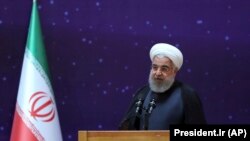 IRAN -- Iranian President Hassan Rohani speaks at a ceremony to mark "National Nuclear Day," dedicated to the country's achievements in nuclear technology, in Tehran, April 9, 2018