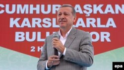 Turkey -- Turkish President Recep Tayyip Erdogan speaks during a rally in the eastern city of Kars, June 3, 2015