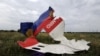 A piece of wreckage from Malaysia Airlines Flight MH17 is seen in Shaktarsk, Ukraine, on July 18.