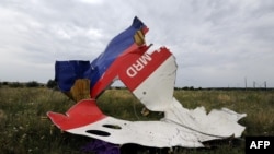 A piece of wreckage from Malaysia Airlines Flight MH17 is seen in Shaktarsk, Ukraine, on July 18.